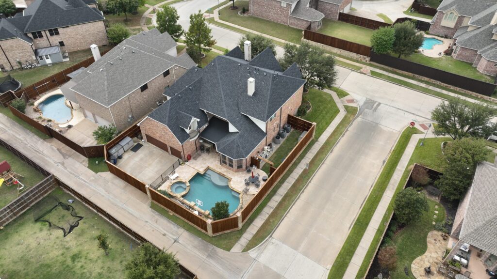 Aerial view of a residential roof and its valleys after replacement