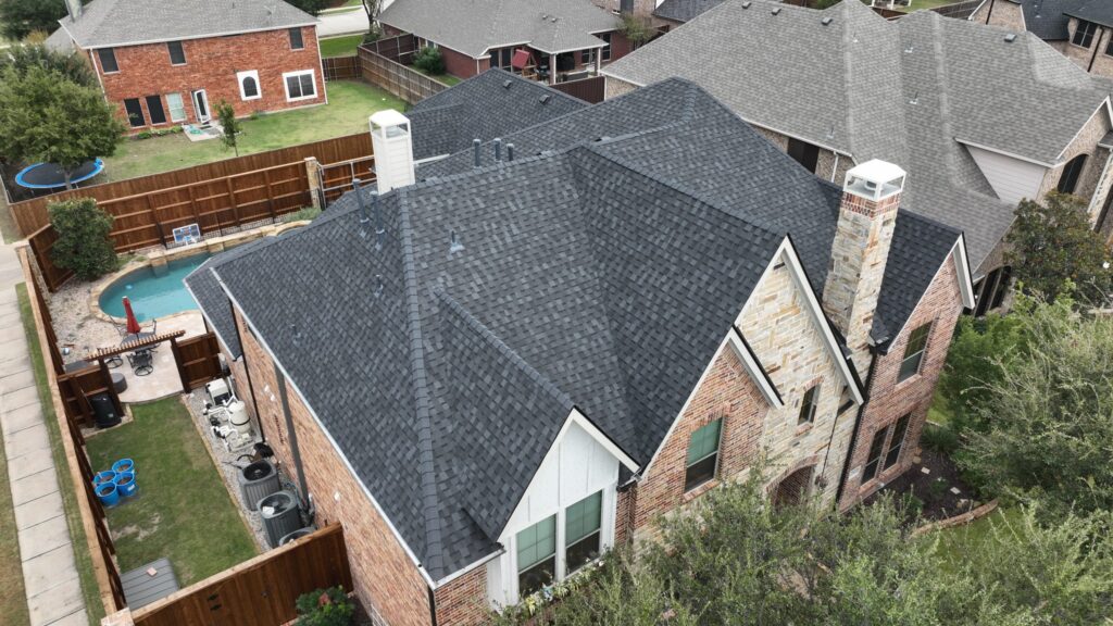 Aerial view of a completed residential roof in North Texas