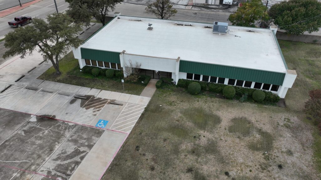 Aerial view of rooftops across a North Texas neighborhood