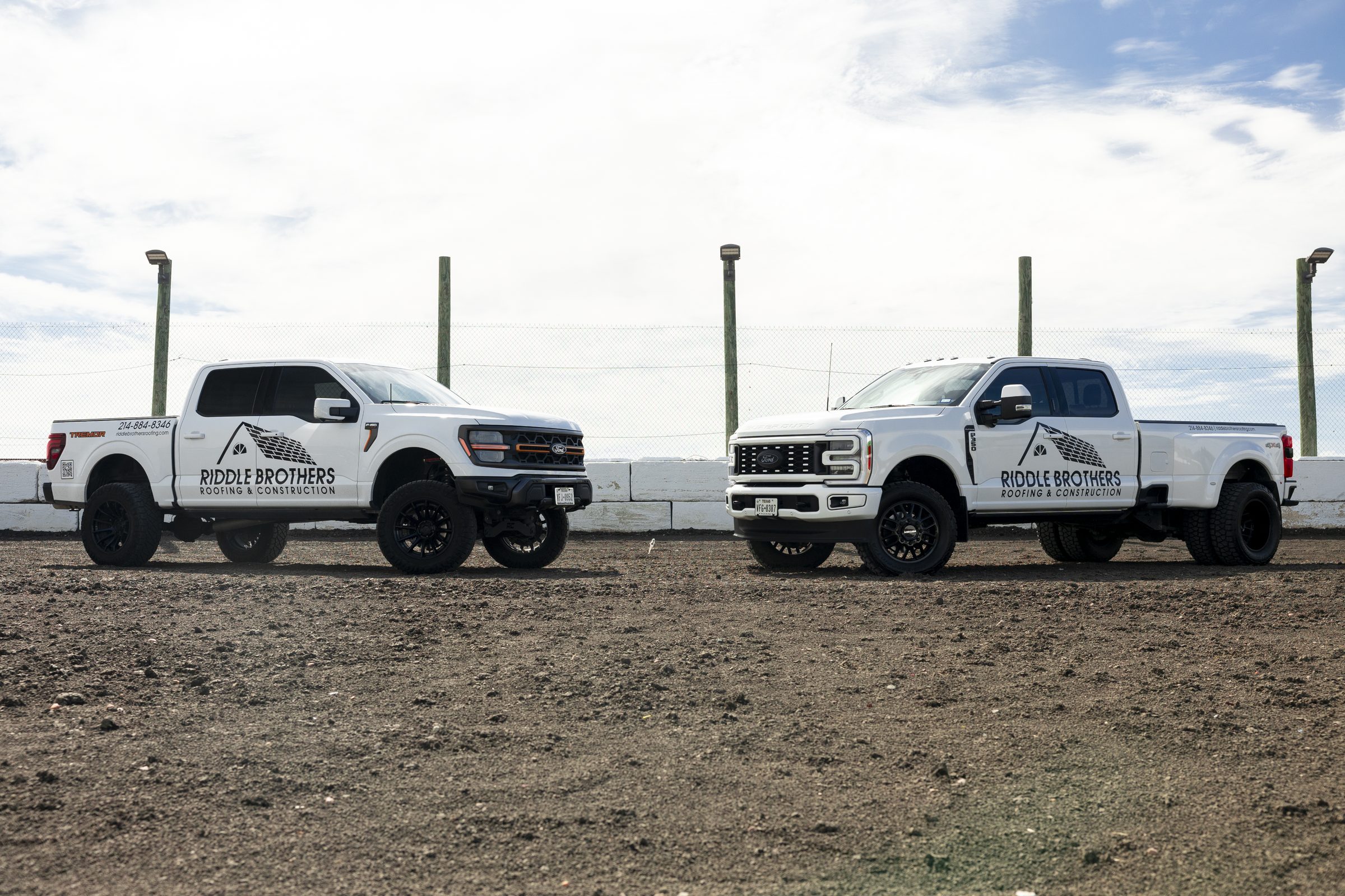 Two Riddle Brothers Roofing and Construction trucks